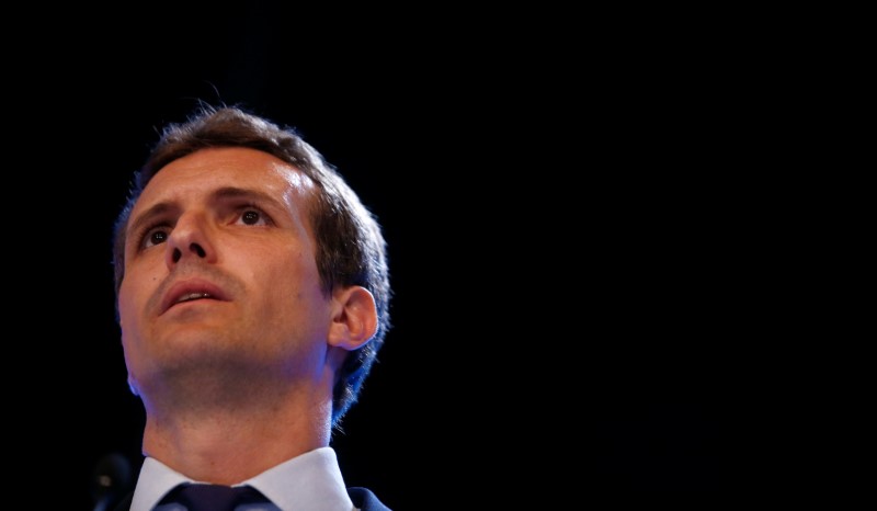 © Reuters. Pablo Casado reacts after being elected as the new leader of Spain's conservative People's Party in Madrid