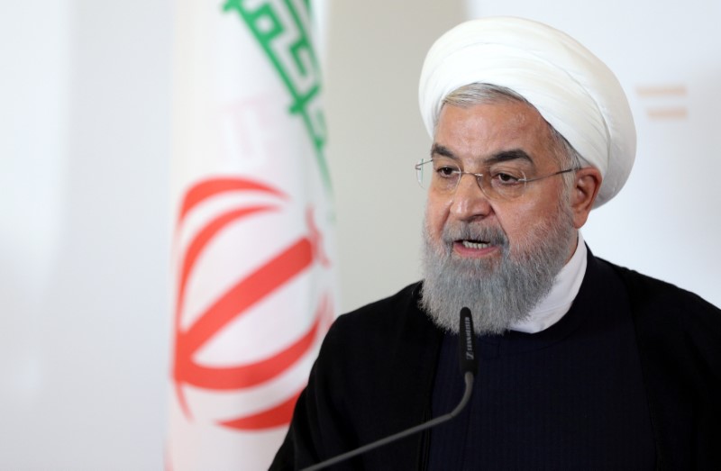 © Reuters. FILE PHOTO: Iran's President Hassan Rouhani attends a news conference at the Chancellery in Vienna