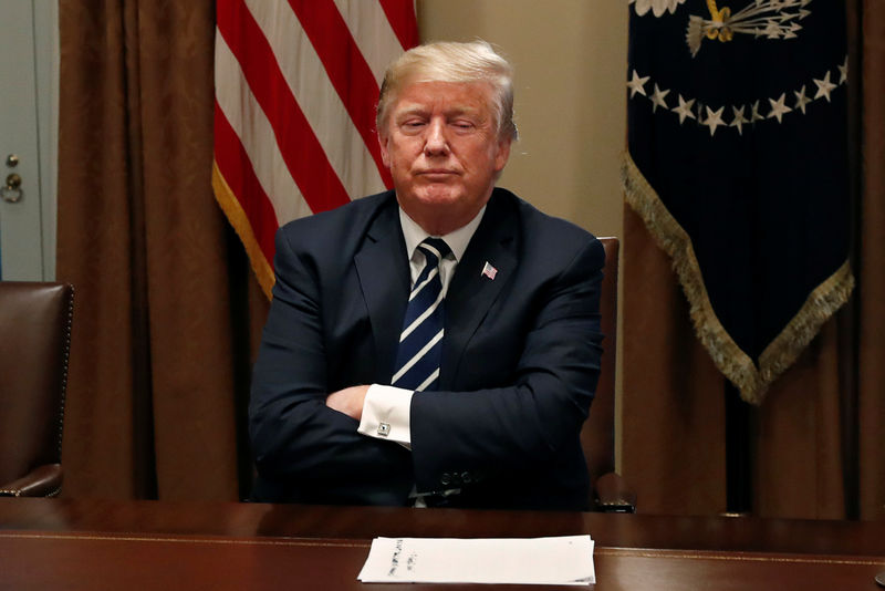 © Reuters. U.S. President Trump waits for reporters to leave the room after speaking about his summit with Russia's President Putin in meeting at the White House in Washington