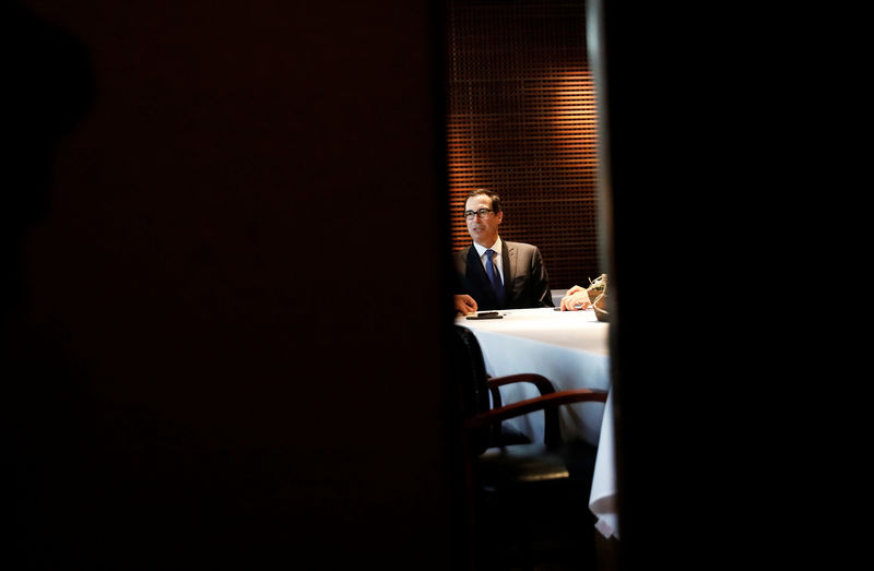 © Reuters. U.S. Treasury Secretary Steven Mnuchin talks during an interview with Reuters in Sao Paulo