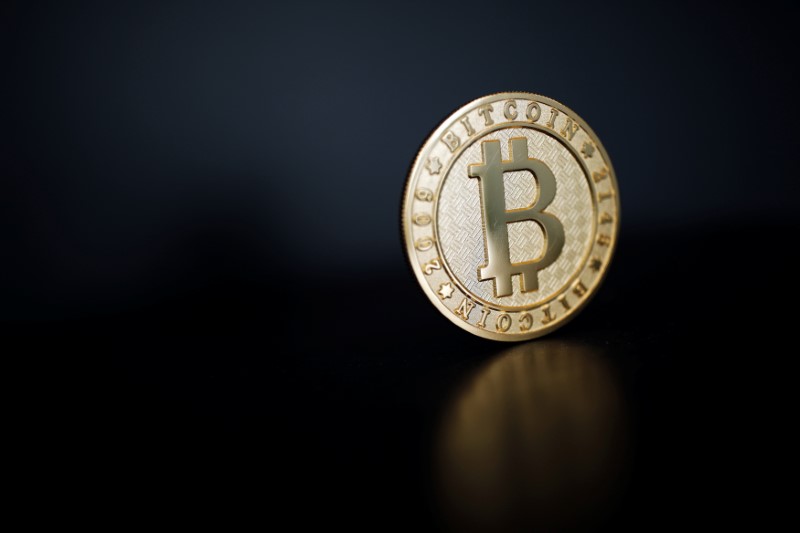© Reuters. A Bitcoin (virtual currency) coin is seen in an illustration picture taken at La Maison du Bitcoin in Paris