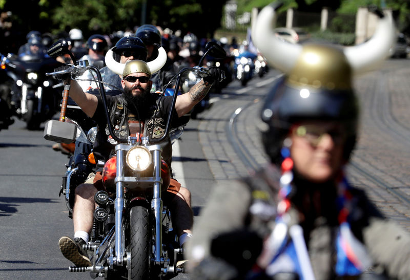 © Reuters. FILE PHOTO: Participants of a motorcycle parade ride their bikes through the center of Prague