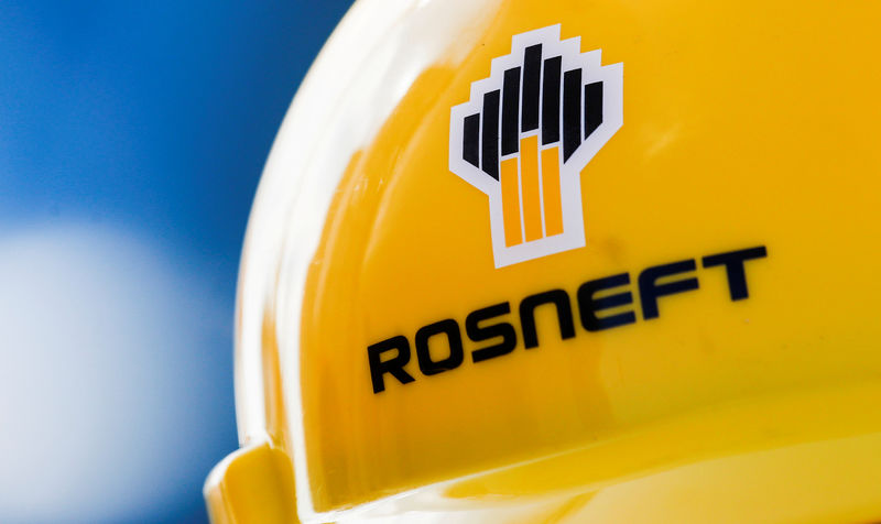 © Reuters. FILE PHOTO: Rosneft logo is pictured on a safety helmet in Vung Tau