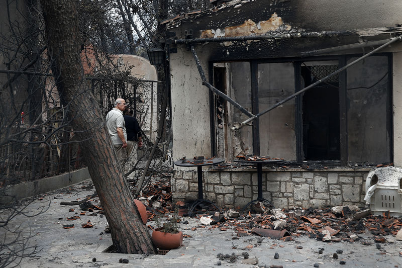 © Reuters. Casa destruída por incêndio em Mati, perto de Atenas