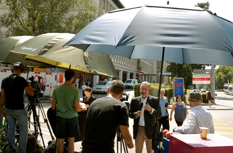 © Reuters. TV crews are seen in front of the university hospital (Universitaetsspital) in Zurich