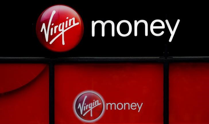 © Reuters. FILE PHOTO: Signage is see outside a branch of Virgin Money in Manchester