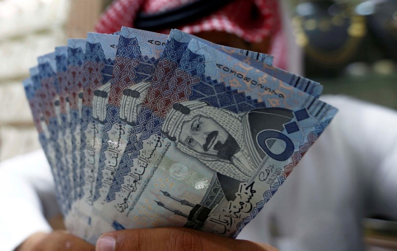 Saudi banks' deposits shrink as government pulls back funds
