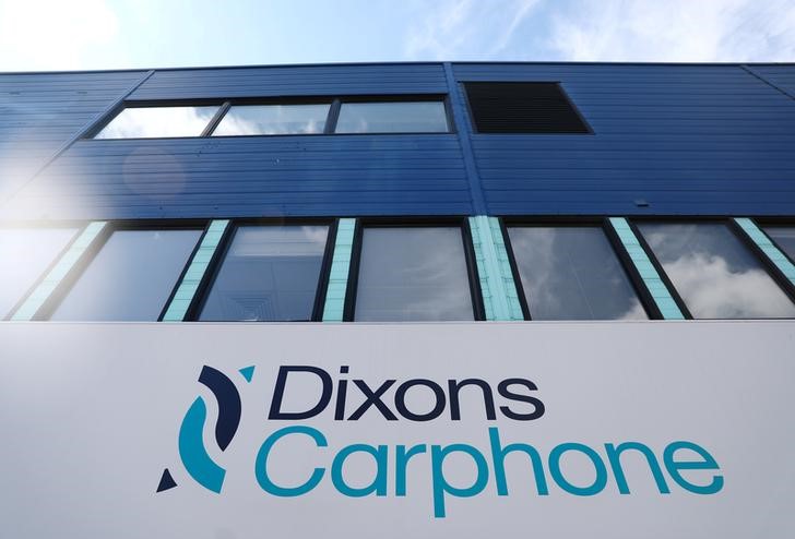 © Reuters. FILE PHOTO: A sign displays the logo of Dixons Carphone at the company headquarters in London