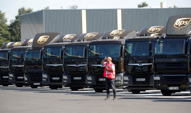 © Reuters. FILE PHOTO: Vehicles of United Parcel Service are seen at the new package sorting and delivery UPS hub in Corbeil-Essonnes and Evry