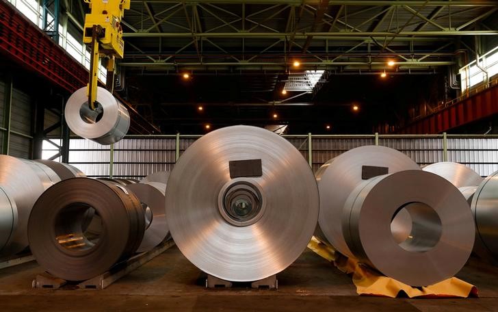 © Reuters. FILE PHOTO: Metal coils are seen at ArcelorMittal steel plant in Ghent