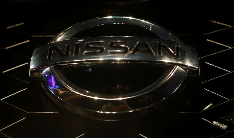 © Reuters. FILE PHOTO: A company logo is seen on the newly-unveiled Nissan "Terrano" compact sport utility vehicle during a news conference in Mumbai