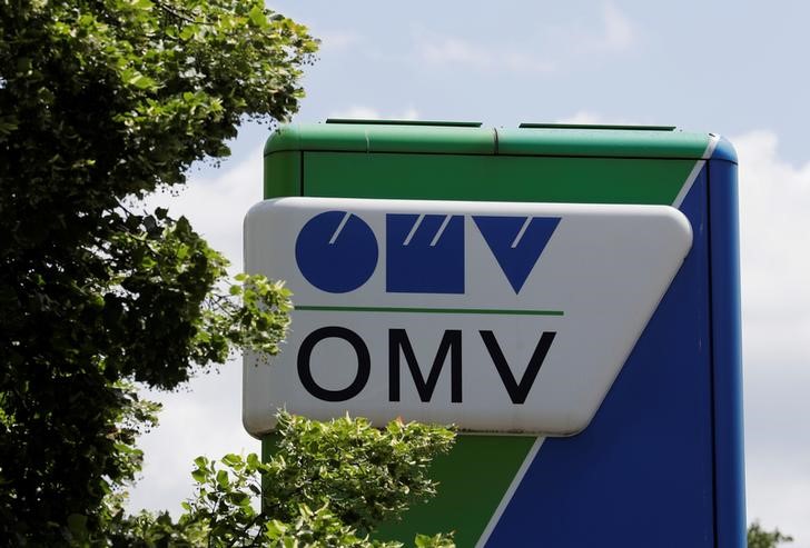 © Reuters. FILE PHOTO - The OMV logo is seen at a gas station in Vienna