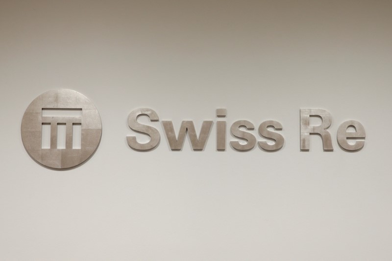 © Reuters. FILE PHOTO: The logo of the world's second largest reinsurer Swiss Re is seen inside the company's offices in Zurich