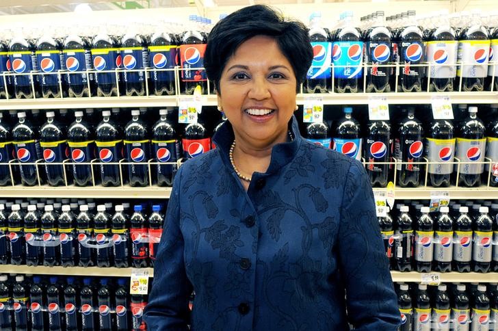 © Reuters. PepsiCo CEO Indra Nooyi poses for a portrait by products at the Tops SuperMarket in Batavia