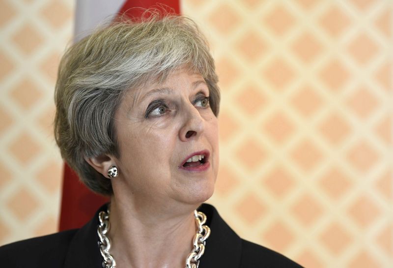 © Reuters. Britain's Prime Minister May addresses the media in Salzburg