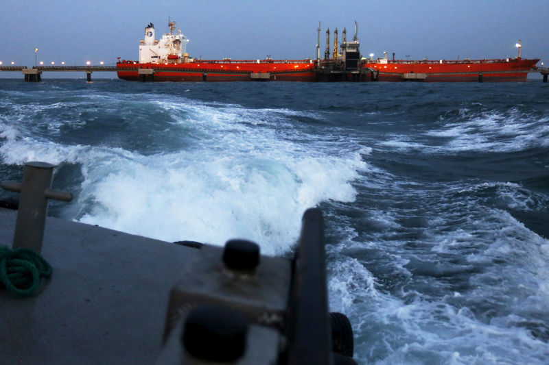 © Reuters. FILE PHOTO: An oil tanker is docked while oil is pumped into it at the ships terminal of PDVSA's Jose Antonio Anzoategui industrial complex in the state of Anzoategui