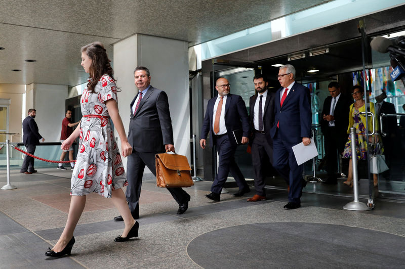 © Reuters. Tukish Deputy Foreign Minister Sedat Onal leaves from the State Department in Washington