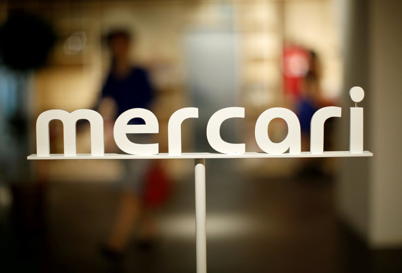 © Reuters. FILE PHOTO The logo of Mercari is displayed at the company's headquarters in Tokyo