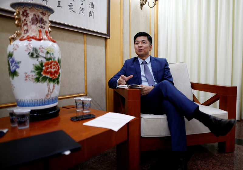 © Reuters. Qu Yuhui, ministro-conselheiro da embaixada chinesa em Brasília, durante entrevista com a Reuters