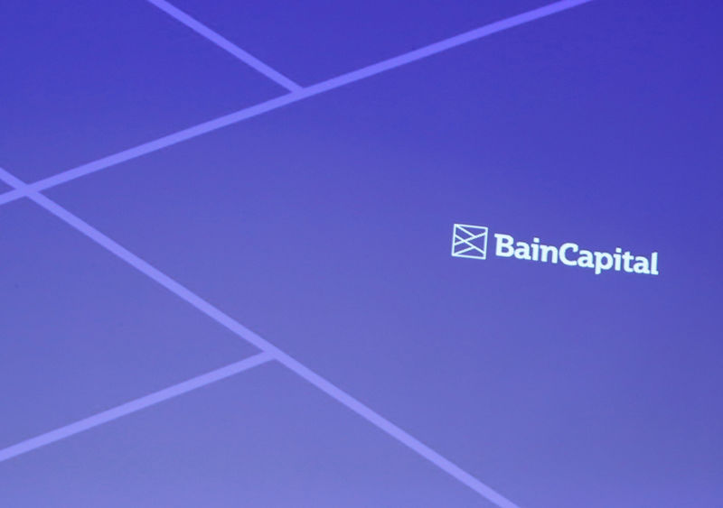 © Reuters. FILE PHOTO: Logo of Bain Capital is screened at a news conference in Tokyo, Japan