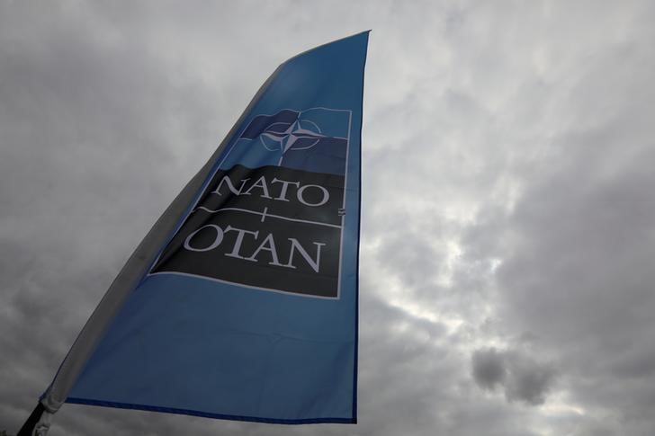 © Reuters. A NATO flag is seen ahead of the Summit in Brussels