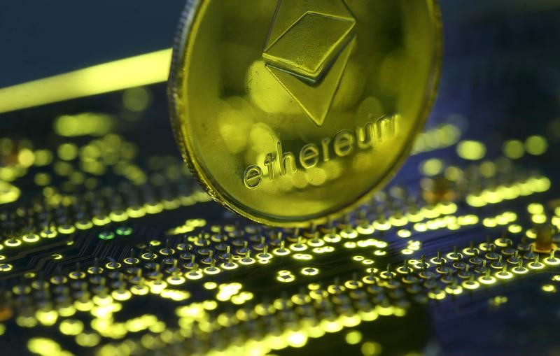 © Reuters. eRepresentation of the Ethereum virtual currency standing on the PC motherboard is seen in this illustration picture