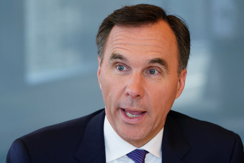 © Reuters. FILE PHOTO:    Canadian Minister of Finance Bill Morneau speaks during an interview with Reuters in Toronto