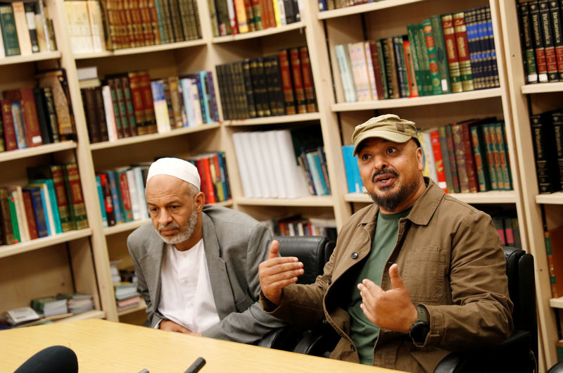 © Reuters. Nassar Mahmood, trustee of Birmingham's Central Mosque, and Ali Mohamed, a representative of the city's Sudanese community speak to jounalists about Salih Khater, at the mosque in Birmingham