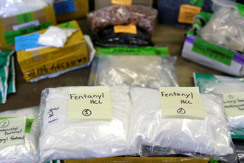 © Reuters. FILE PHOTO: Plastic bags of Fentanyl are displayed on a table at the U.S. Customs and Border Protection area at the International Mail Facility at O'Hare International Airport in Chicago
