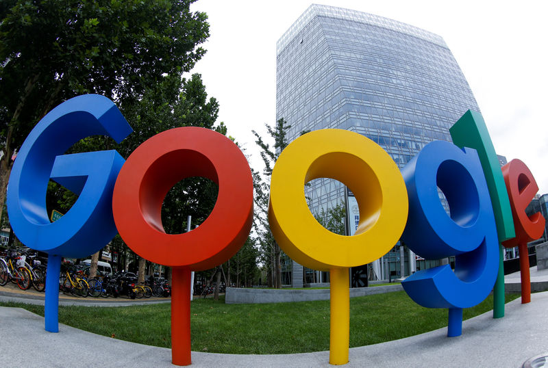 © Reuters. FILE PHOTO: The brand logo of Alphabet Inc's Google is seen outside its office in Beijing