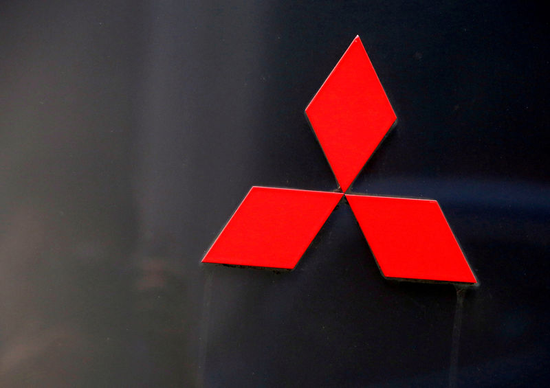 © Reuters. FILE PHOTO: The signboard of Mitsubishi Corp is pictured at its head office in Tokyo