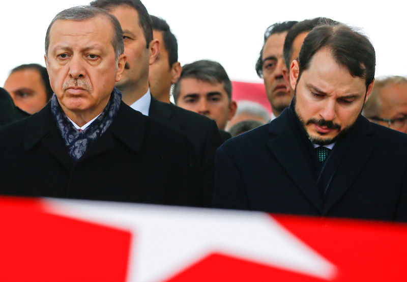 © Reuters. FILE PHOTO: Turkish President Erdogan attends a funeral ceremony for police officer Hasim Usta who was killed in Saturday's blasts in Istanbul