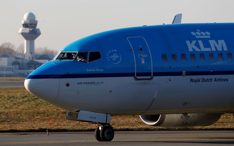 © Reuters. FILE PHOTO: KLM Boeing 737 aircraft taxis to runway at the Chopin International Airport in Warsaw