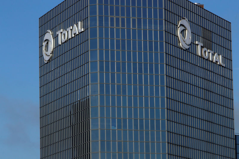 © Reuters. The logo of Total is seen on the headquarters tower of French oil giant Total at La Defense business and financial district in Courbevoie near Paris