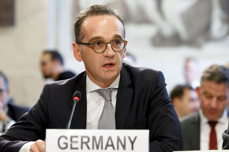 © Reuters. FILE PHOTO:  German Minister of Foreign Affairs Heiko Maas delivers his statement, during the Geneva Conference on Afghanistan, at the European headquarters of the United Nations in Geneva