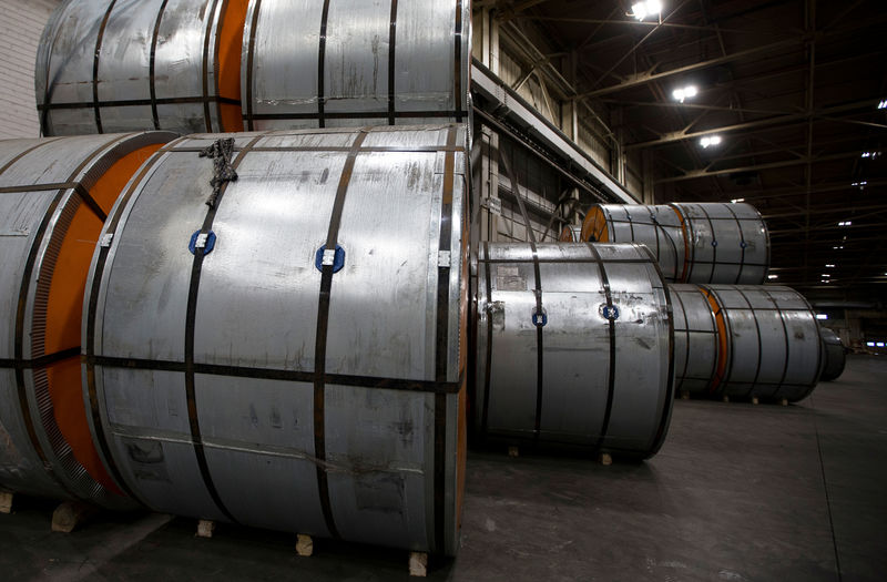 © Reuters. Coils of steel sit in storage in a port authority facility in Hamilton