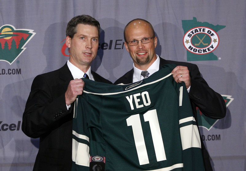 © Reuters. Minnesota Wild general manager Fletcher stands with new head coach Mike Yeo in St. Paul