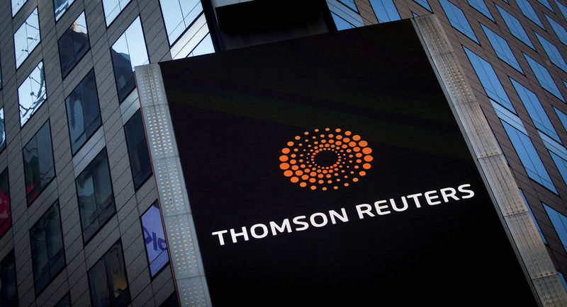 © Reuters. FILE PHOTO: The Thomson Reuters logo is seen on the company building in Times Square, New York