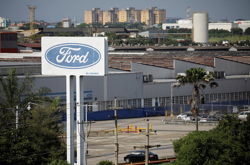 © Reuters. FILE PHOTO: The corporate logo of Ford is seen on a billboard at the facilities of the company in Valencia