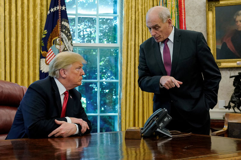 © Reuters. FILE PHOTO: U.S. President Trump speaks to Chief of Staff Kelly after an event with reporters in the Oval Office at the White House in Washington