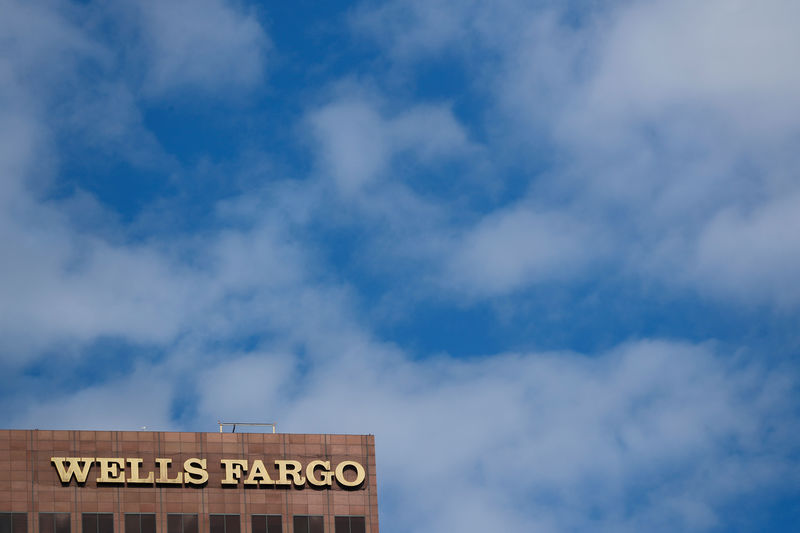 © Reuters. FILE PHOTO: The Wells Fargo name is shown on an office town in downtown Los Angeles