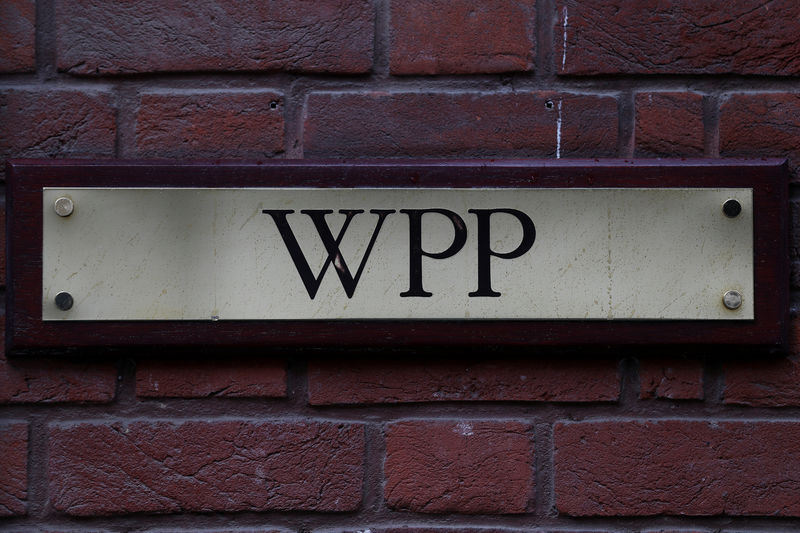 © Reuters. FILE PHOTO: A logo hangs on the wall outside the WPP offices in London