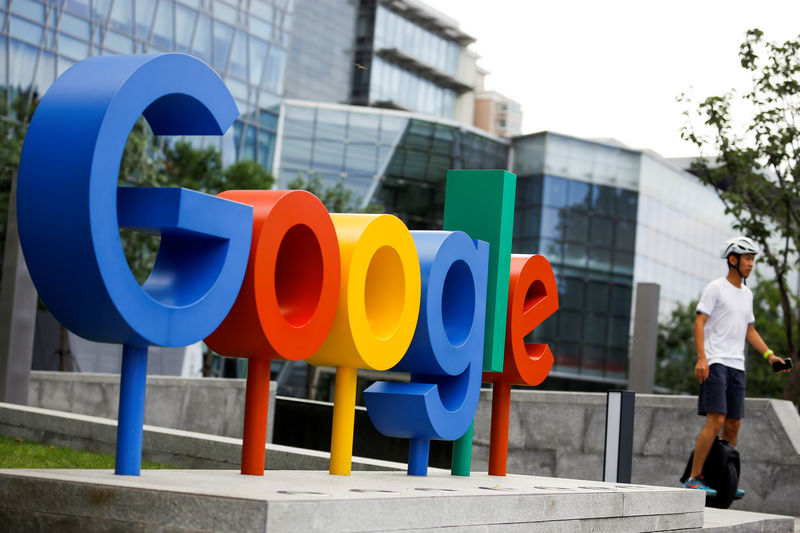 © Reuters. FILE PHOTO: The brand logo of Alphabet Inc's Google is seen outside its office in Beijing