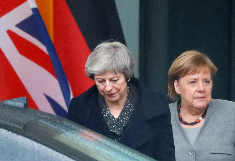 © Reuters. Merkel and May discuss Brexit in Berlin