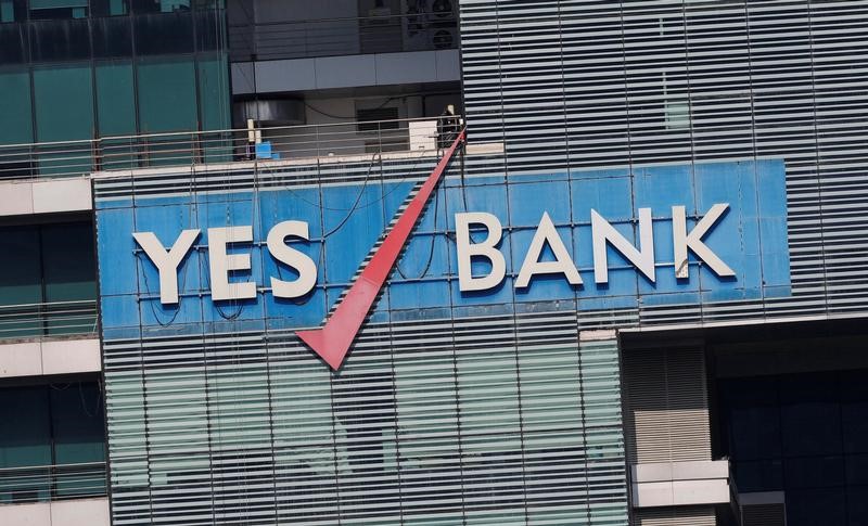© Reuters. The logo of Yes Bank is pictured on the facade of its headquarters in Mumbai
