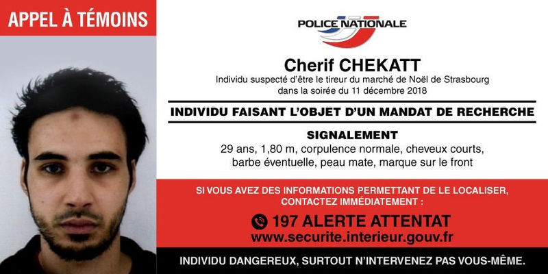 © Reuters. French Police post call for witnesses for Strasbourg-bon Cherif Chekatt the day after a gun attack in Strasbourg