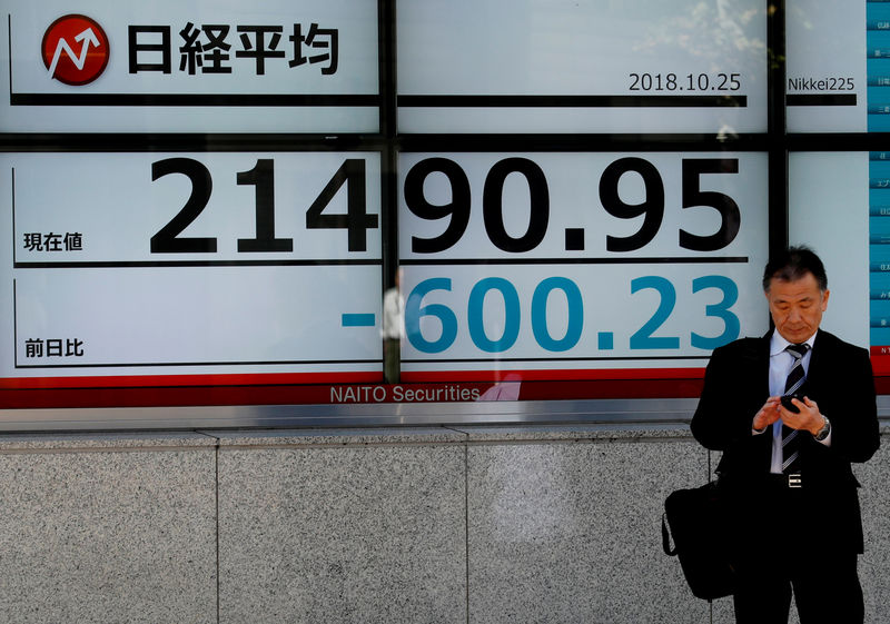 Weak economic data send world stocks tumbling