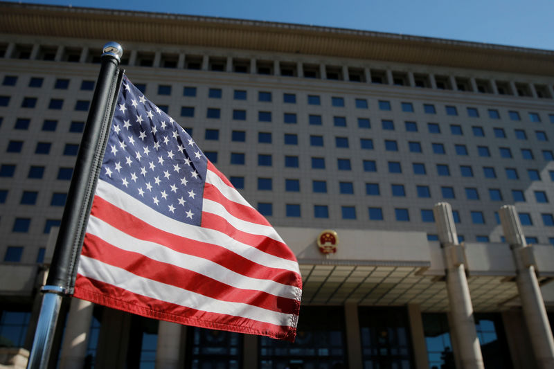 © Reuters. The U.S. flag flutters on a diplomatic car after a meeting of China's Vice Chairman of the Central Military Commission Xu Qiliang and U.S. Defense Secretary Jim Mattis at the Bayi Building in Beijing