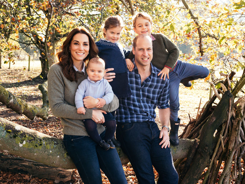 © Reuters. Britain's Prince William, the Duchess of Cambridge, with their three children, Prince Louis, Princess Charlotte and Prince George (right) at Anmer Hall in Norfolk in 2018. This photograph features on their Christmas card this year.