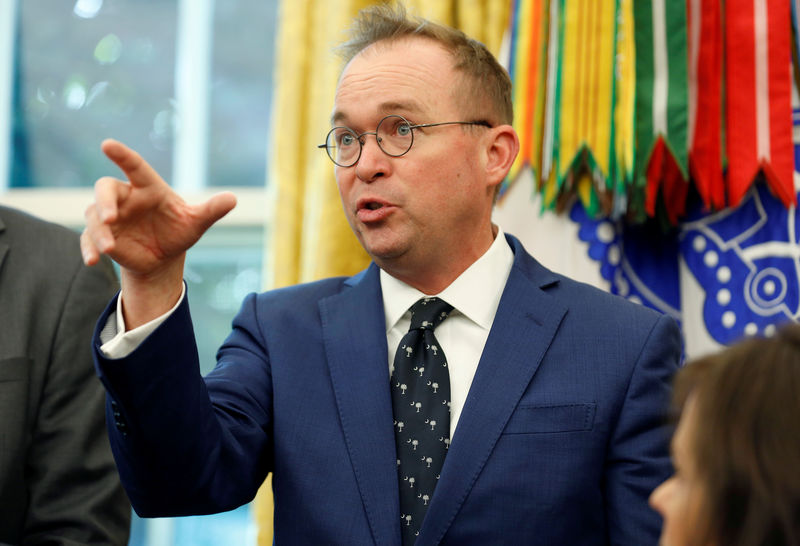 © Reuters. FILE PHOTO: OMB Director Mulvaney speaks during an event in the Oval Office of the White House in Washington